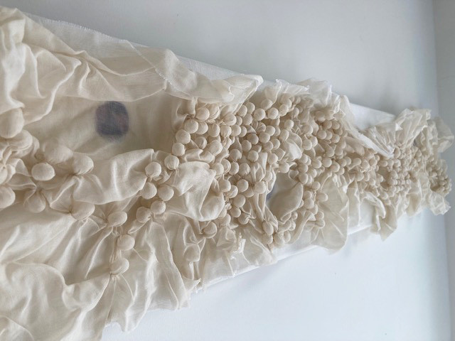 *Discovery*, manipulated textiles, 150 x 20cm