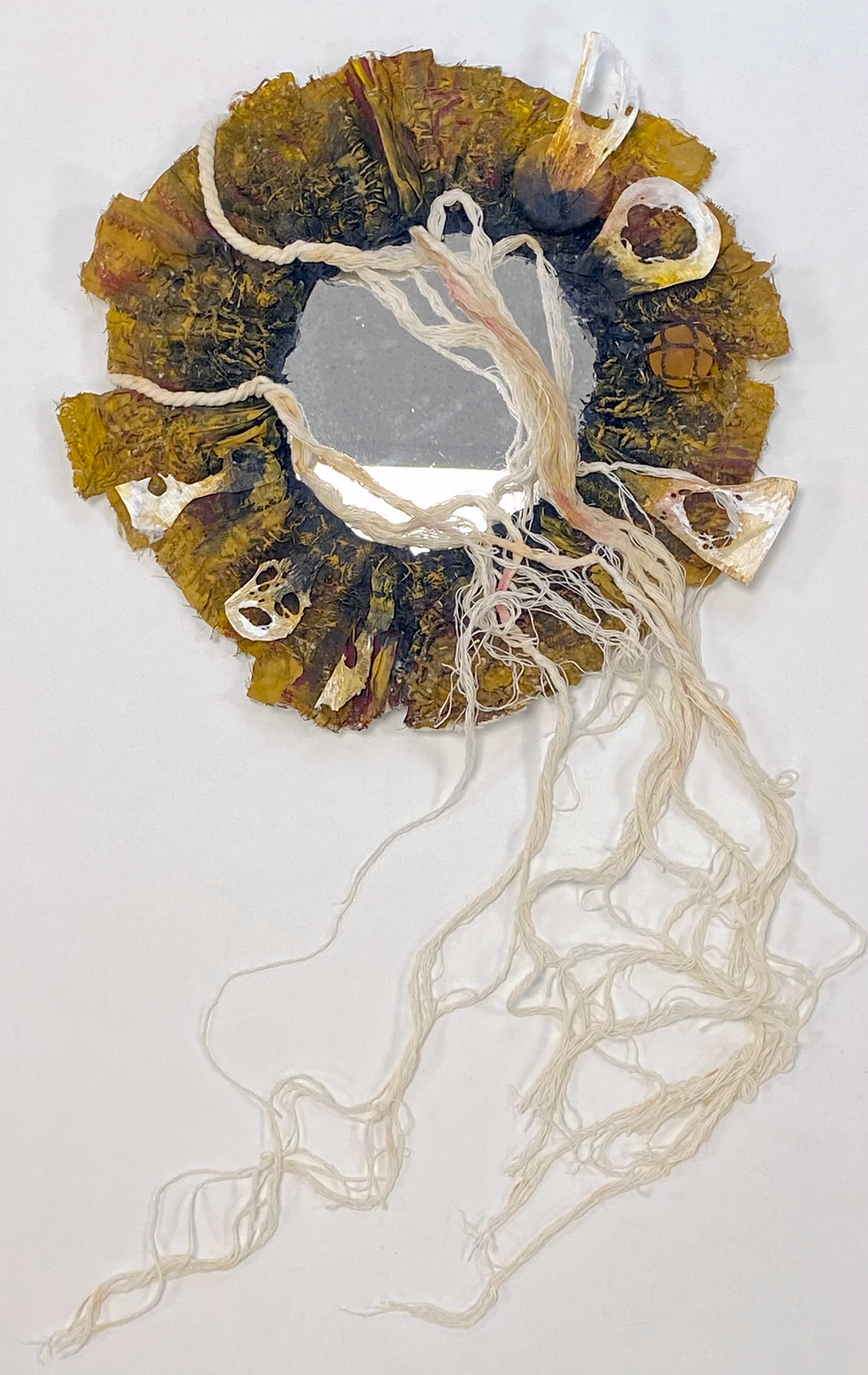 *Underland – Some Excavations*, mixed media textile and glass sculpture, deconstructed repurposed fabrics, found objects, acrylics, couched recycled rope thread, heated Tyvek and mirror, 60 x 30cm