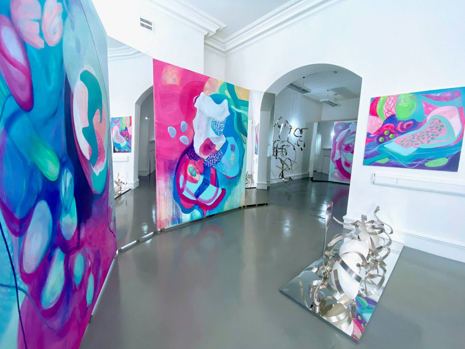 *Installation View 1*, oil paintings on linen, porcelain, aluminium sculptures and mirrors