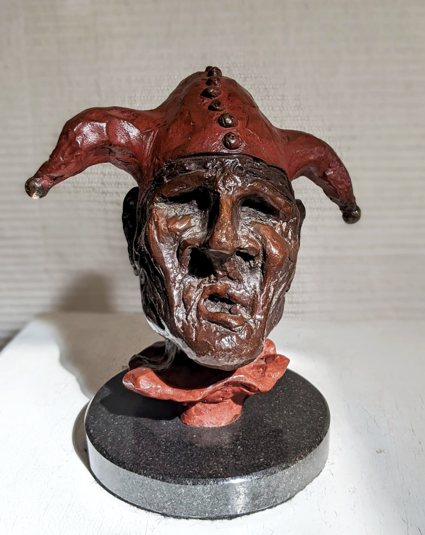 *The Fool*, patinated cast bronze on granite, 20cm