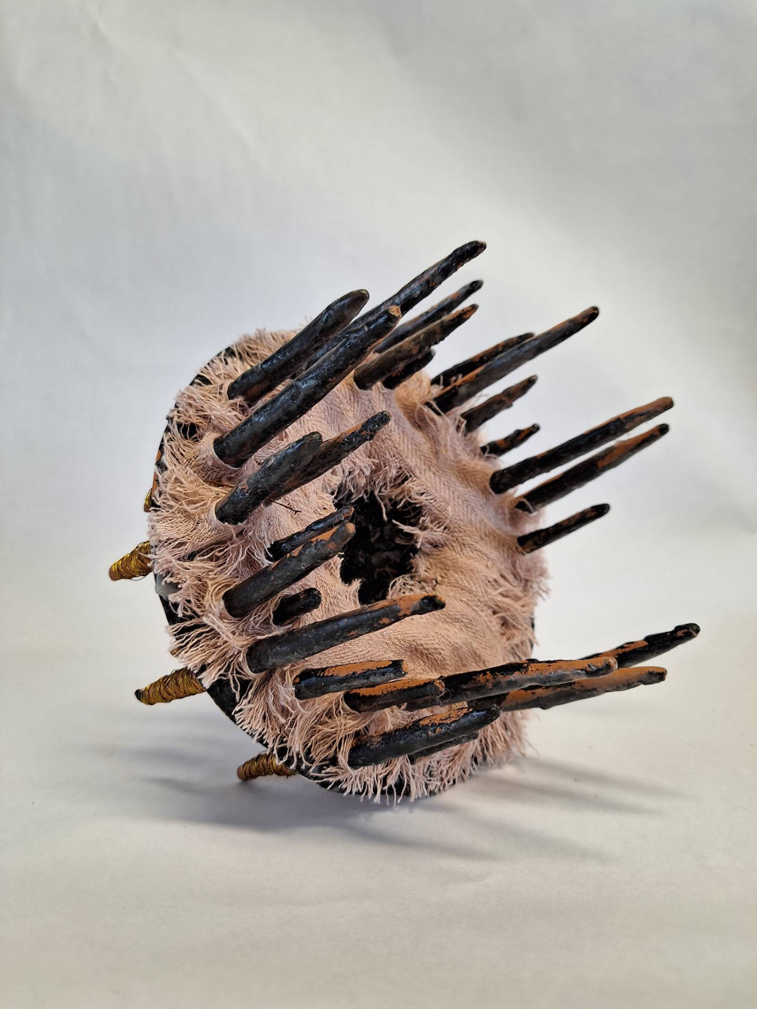 *Tobar,* earthenware, wax, wire and fabric, 20 x 20 x 17cm
