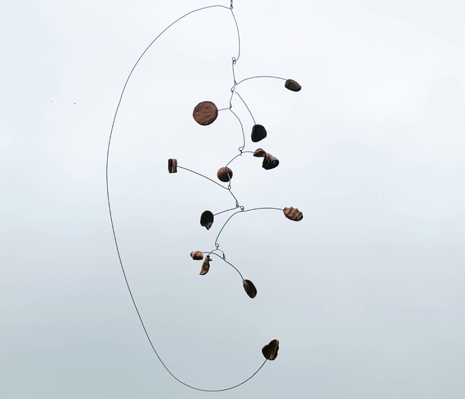 *Influence*, kinetic installation, wire and ceramic