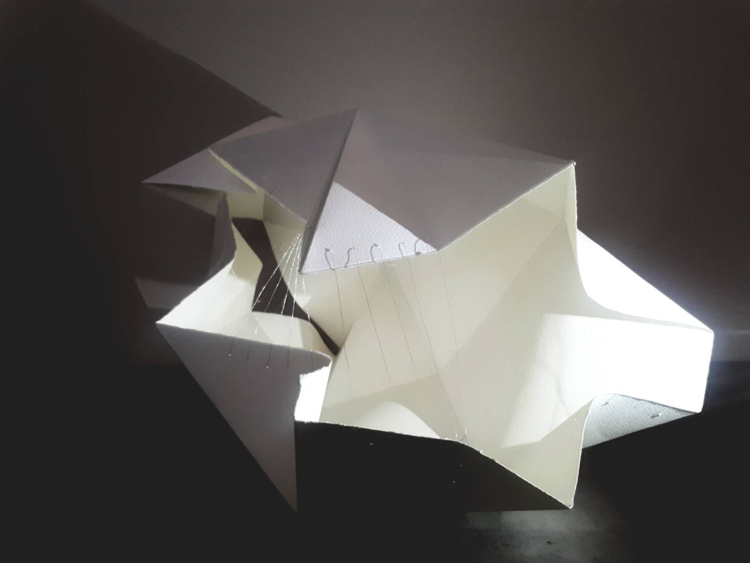 *dwell*, fabriano paper sculpture, silver threads