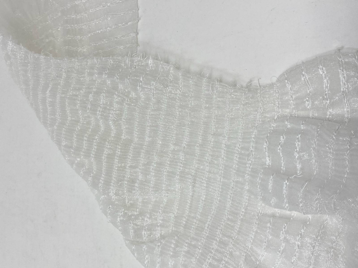 Transparent woven gathered fabric